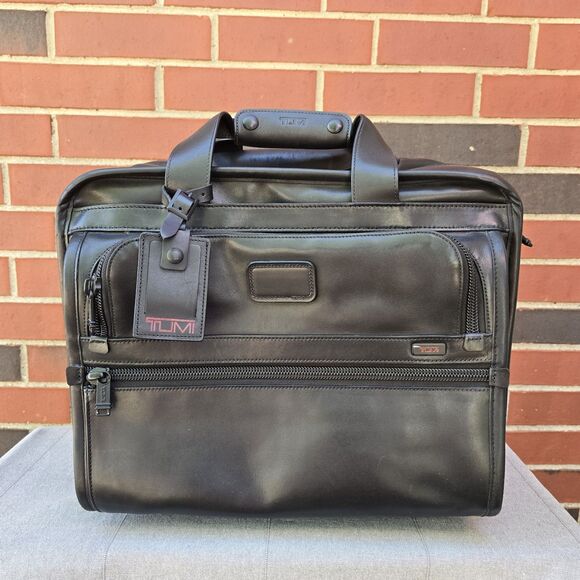 Authentic TUMI Black Leather Compact Wheeled Laptop Briefcase 96102DH $795 - Picture 1 of 13
